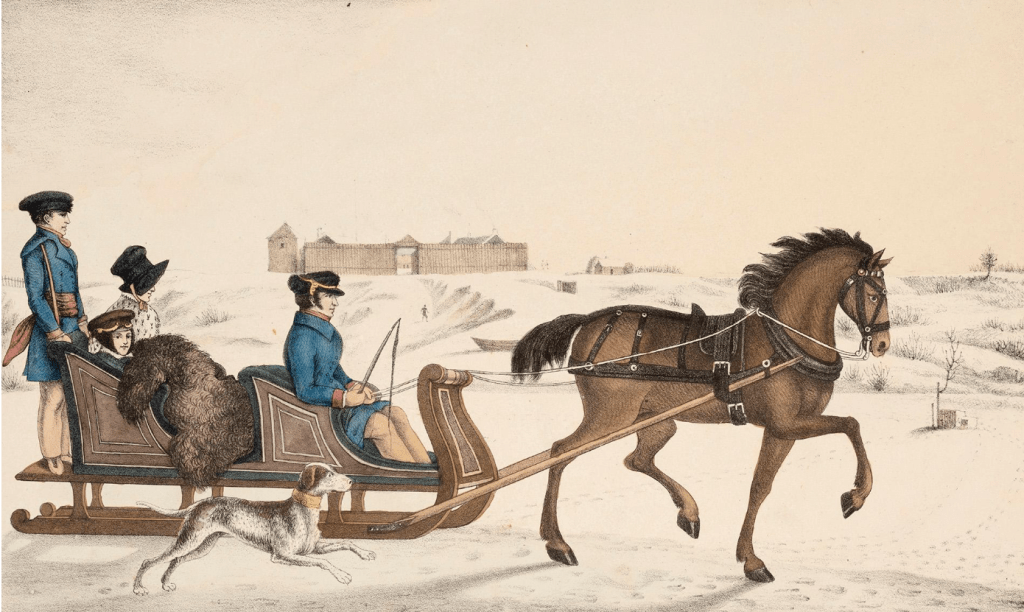 A winter scene with a large building or wooden fort in the background. In the foreground is a sled with two seats facing forward, one behind the other, being pulled by a brown horse. A man in a blue jacket and black cap sits in the first seat and a woman and child with a fur blanket sit in the back. Another man also in a blue jacket and black hat stands at the very back of the sled. A white dog with a yellow collar runs parallel to the sled. 